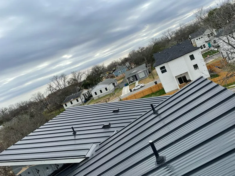 Standing seam metal roof panels with vents for Skylight Repair in Chicago